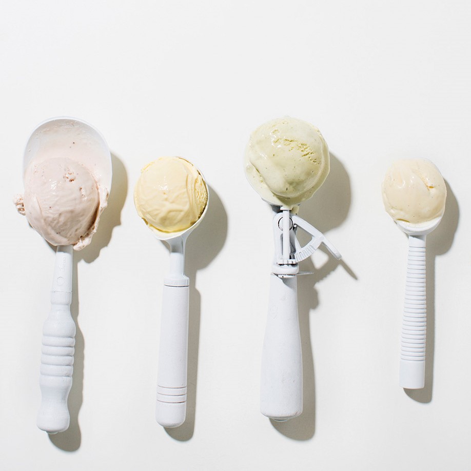 Four ice cream scoops with ice cream.