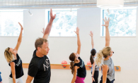 A group of people train at  Edina’s new Barre3 studio