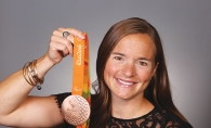 U.S. veteran and Paralympian Melissa Stockwell holding medal