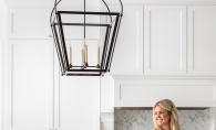 Bria Hammel decorating a kitchen.