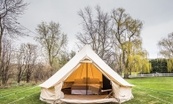 Pitch a glamping tent in your backyard.