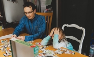 Dad and child distance learning
