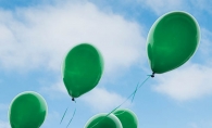 Green balloons from Jerry's Foods honor a young boy's Irish heritage after his passing. 