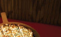 Perfect for snacking or a summer supper, Red’s Savoy serves up a variety of delicious pizza pies.