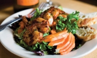 The once exotic papaya tops this tasty shrimp salad at Beaujo’s Wine Bar and Bistro.