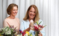 Karen Wooldridge and Laura Hogan of Bluebirds & Blooms prepare a bouquet.