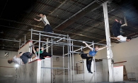 Chad Zwadlo, Mitch Andrejka,  Colin Cooper and Josh Carlson demonstrate advanced parkour techniques at Fight or Flight Academy in Edina. 