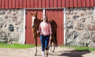 Edina artist Claire Jensen with her muse, a horse named Mama.