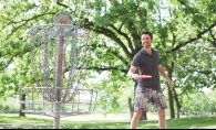 Bobby Hart tries out the disc golf course at Rosland Park. 