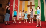 Rebekah Moir, left, gives stage direction to Jeremiah Players Club members Libby Strittmater, Lorelai Nelson, Ellison Salyards, Lily Salyards and Eiledon Moir at Calvary Lutheran Church in Edina.