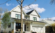 A tree donated by Trees From Refined sits in the yard of an Edina home.