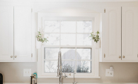 A white, clean kitchen.