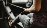 Woman using exercise equipment