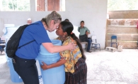 A Rotary Club of Edina member embraces a Guatemalan woman.