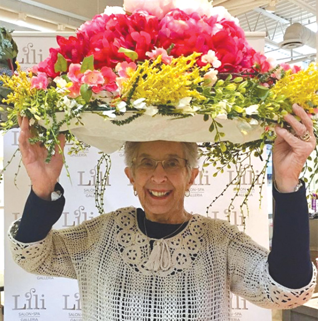 @cindyminnesota models a flower hat at the Galleria Garden Party