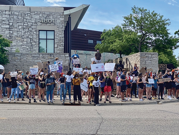 Protesters at a march for justice for George Floyd in Edina