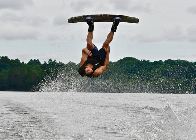 A wakeboarder surfs on a Minnesota lake.