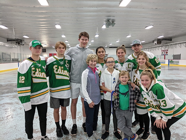 Hockey players pose for a photo at the 2019 Big Futures Tournament and Family Festival.