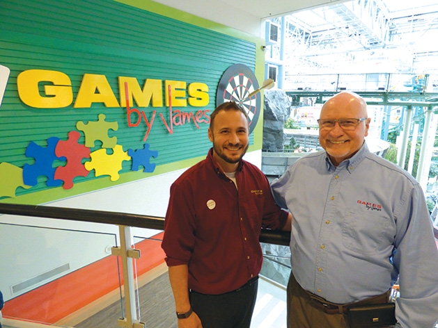 Owner Logan McKee and his father Glenn McKee at Games by James' 40th anniversary celebration