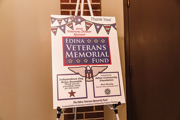 A sign advertising the Edina Veterans Memorial Fund