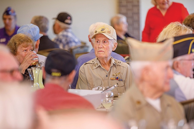 Veterans seated at the table at Edina Veterans DInner