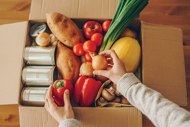 A box packed with food from VEAP Food Shelf