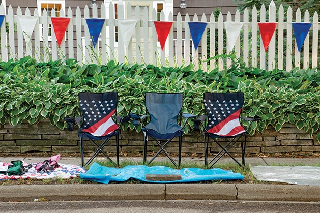 Empty chairs sit on 50th Street in anticipation of Edina's Fourth of July parade.