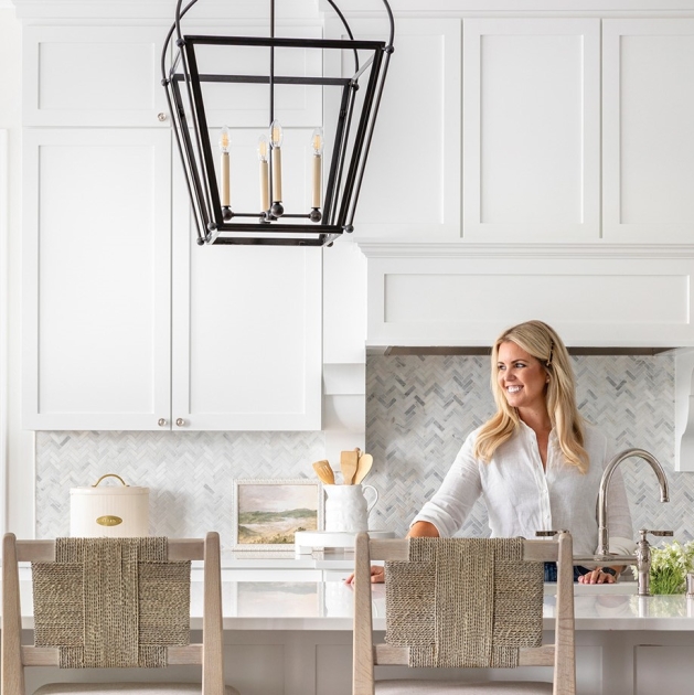 Bria Hammel decorating a kitchen.