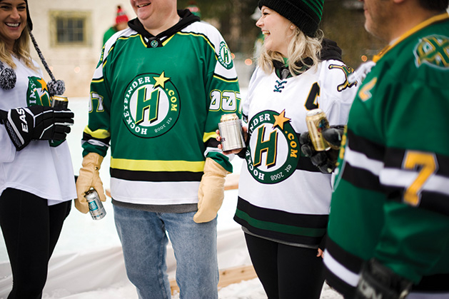 Pickup hockey players from Hockey Finder enjoy a beer after a game.