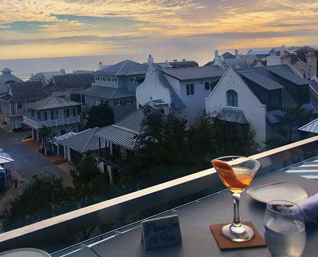 A cocktail on a table at a vacation destination.