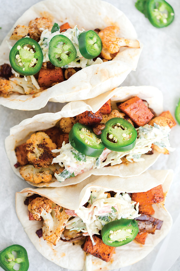 Roasted cauliflower sweet potato tacos from Greens + Chocolate.