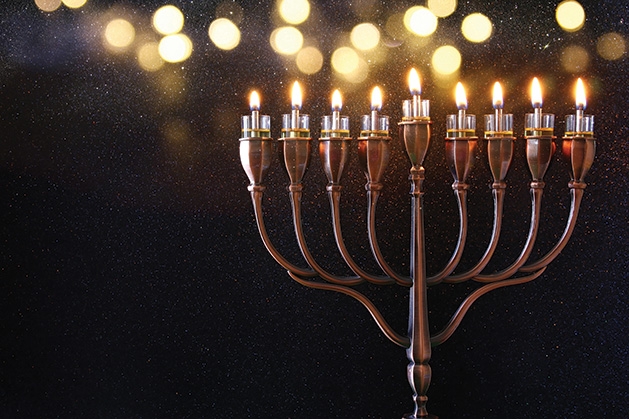 A lit menorah.