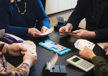 Seniors at the Edina Senior Center play a game of bridge.