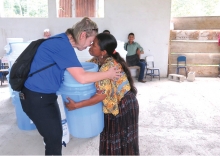 A Rotary Club of Edina member embraces a Guatemalan woman.