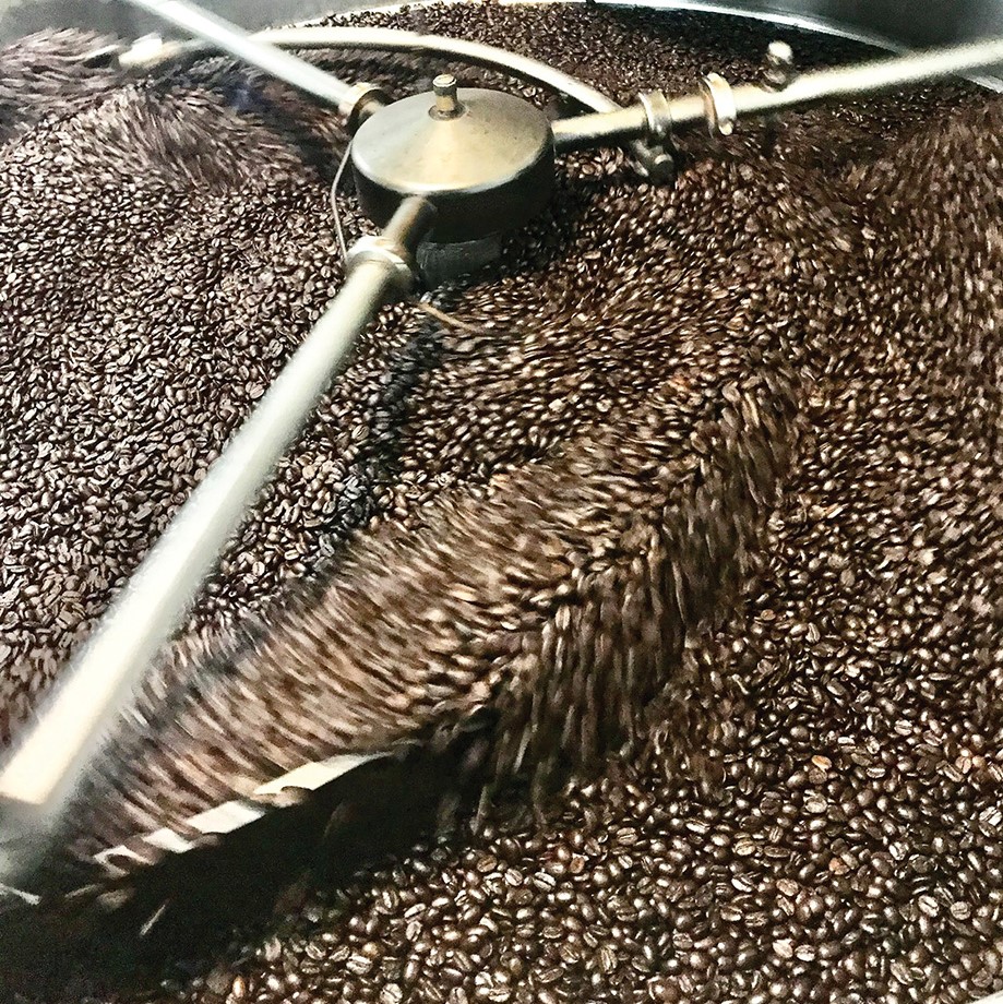 Coffee beans being roasted at the Berry Coffee Company roasting plant.