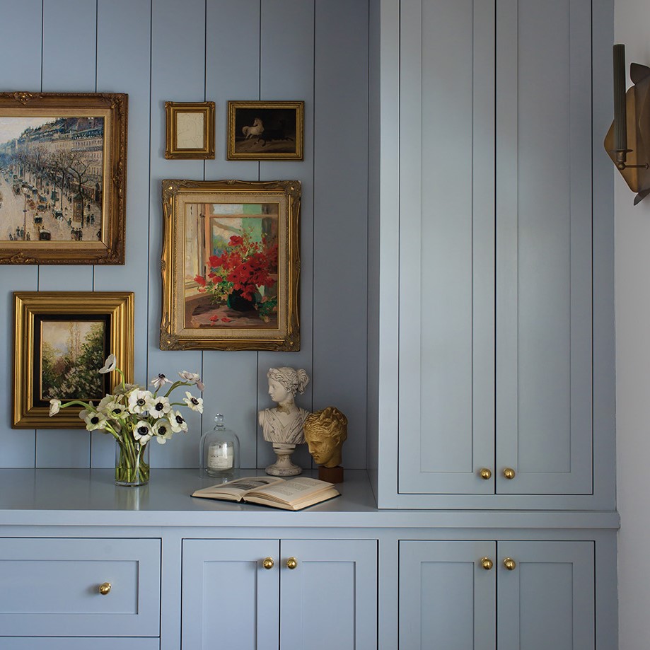 Light blue cabinetry designed by Oho Interiors.