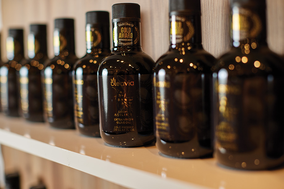 Bottles of Oleavia EVOO.