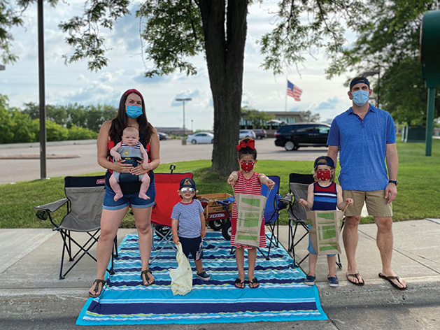 A family poses for a Fourth of July photo.