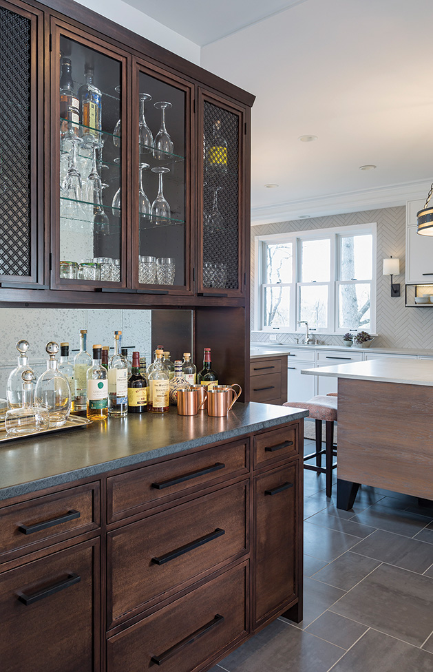 A bar in a home remodeled by Quartersawn