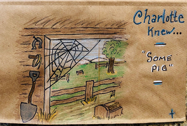 A lunch bag decorated with a scene from "Charlotte's Web"