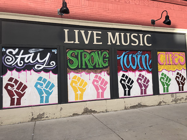 A mural reading "Stay Strong Twin Cities."